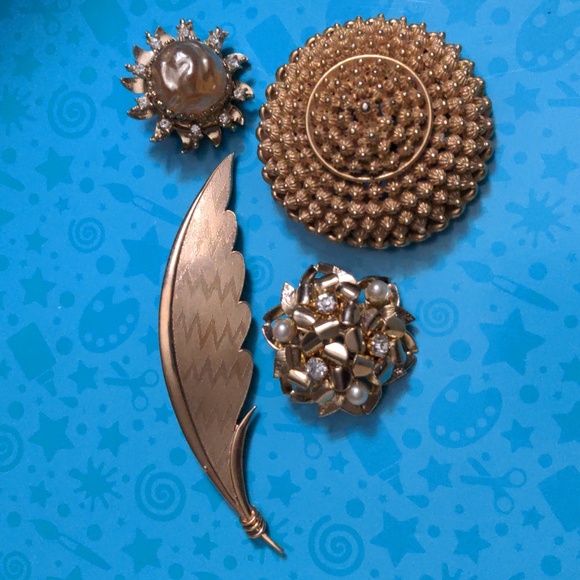 Coro Jewelry - Four Coro Brooches A208